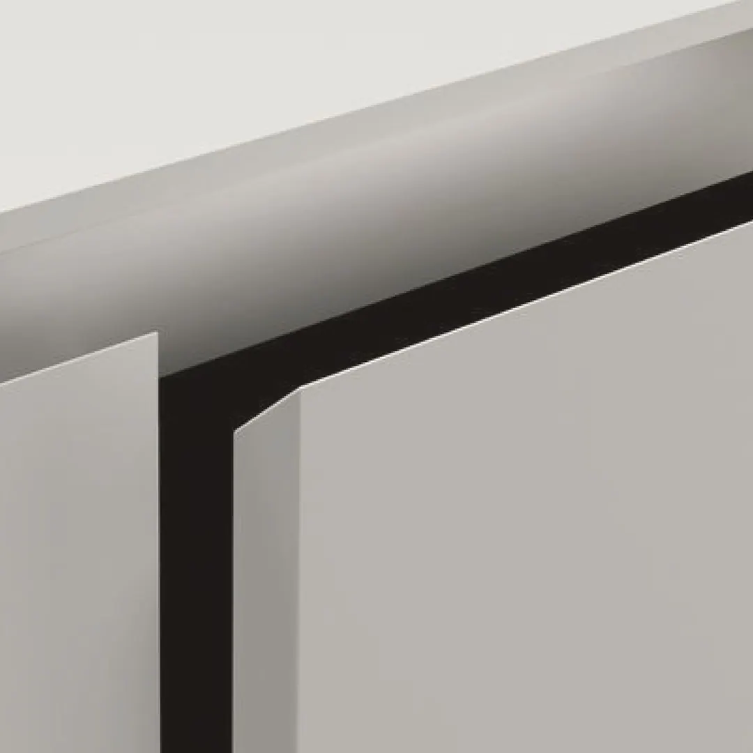 Gola handleless system: close-up of the continuous black channel along the top and side door edges